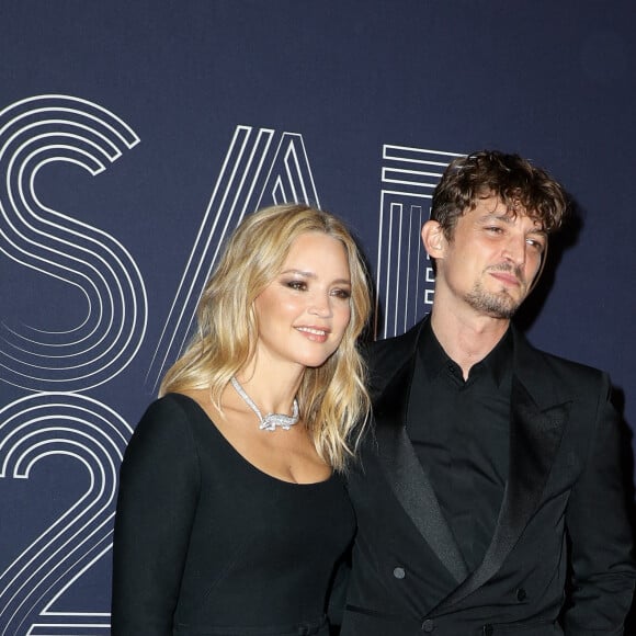 Virginie Efira et son compagnon Niels Schneider (en YSL) - Photocall de la 47ème édition de la cérémonie des César à l'Olympia à Paris, le 25 février 2022. © Borde-Jacovides/Bestimage 