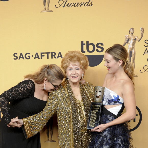 Debbie Reynolds, sa fille Carrie Fisher et Billie Lourd - Press room lors de la 21ème cérémonie annuelle des "Screen Actors Guild Awards" à l'auditorium "The Shrine" à Los Angeles, le 25 janvier 2015. 