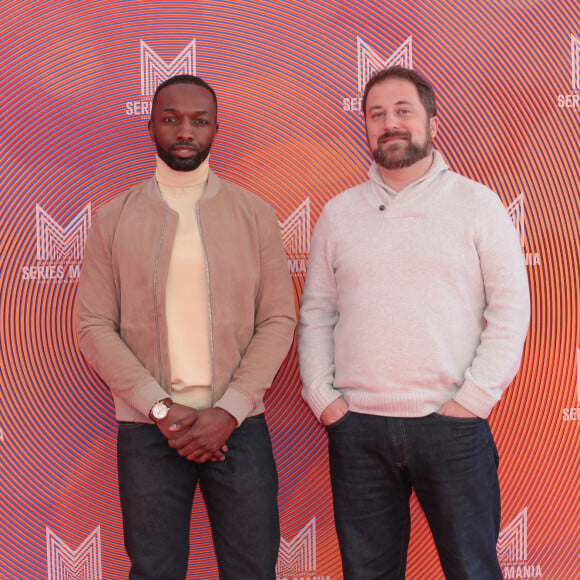 Jamie Hector , Justin Fenton ( auteur du livre dont la serie est adaptée ) . lors du Festival Séries Mania (festival international consacré aux séries télévisées du monde entier) à Lille, France, le 19 mars 2022. © Stéphane Vansteenkiste/Bestimage 