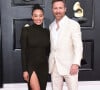 David Guetta et sa compagne Jessica au photocall de la 64ème édition des Grammy Awards au MGM Grand Garden à Las Vegas