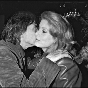Archives - David Bailey et son ex-femme Catherine Deneuve lors du défilé Yves Saint Laurent, en 1983.