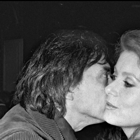 Archives - David Bailey et son ex-femme Catherine Deneuve lors du défilé Yves Saint Laurent, en 1983.