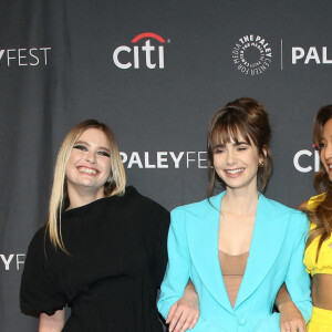 Camille Razat, Lily Collins et Ashley Park - Photocall de la saison 2 de la série Netflix "Emily in Paris" lors du PaleyFest LA à Los Angeles, le 10 avril 2022.