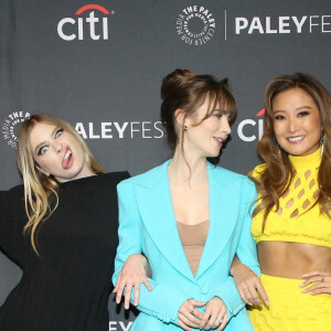 Camille Razat, Lily Collins et Ashley Park - Photocall de la saison 2 de la série Netflix "Emily in Paris" lors du PaleyFest LA à Los Angeles, le 10 avril 2022.