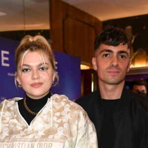 Louane et son compagnon Florian Rossi - Avant Première de " Belle " film animé japonais au Grand Rex à Paris le 6 décembre 2021 . © Veeren / Bestimage 