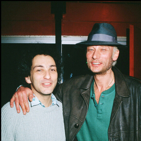 Michel Berger et Johnny Hallyday lors du concert de Michel Berger au Zénith en 1986