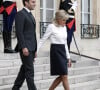 Le président français Emmanuel Macron accompagné de la première dame, Brigitte Macron, habillée par Louis Vuitton, recoit Narendra Modi, Premier ministre de la République de l'Inde, pour un entretien au palais de l'Elysée.