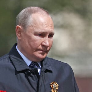 Le président russe Vladimir Poutine assiste à la parade du Jour de la Victoire, marquant le 77e anniversaire de la victoire des Alliés pendant la Seconde Guerre mondiale à Moscou, Russie, le 9 mai 2022.