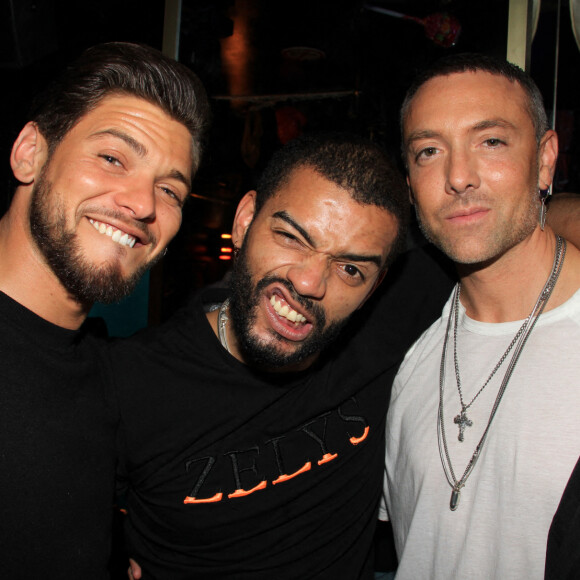 Exclusif - Rayane Bensetti, Brahim Zaibat et Maxime Dereymez lors d'une soirée à la discothèque "LE BAZAÄR" à Paris, France © Philippe Baldini/Bestimage