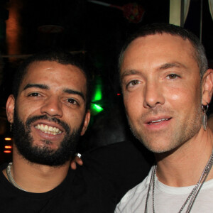 Exclusif - Rayane Bensetti, Brahim Zaibat et Maxime Dereymez lors d'une soirée à la discothèque "LE BAZAÄR" à Paris, France, le 14 mai 2022. © Philippe Baldini/Bestimage