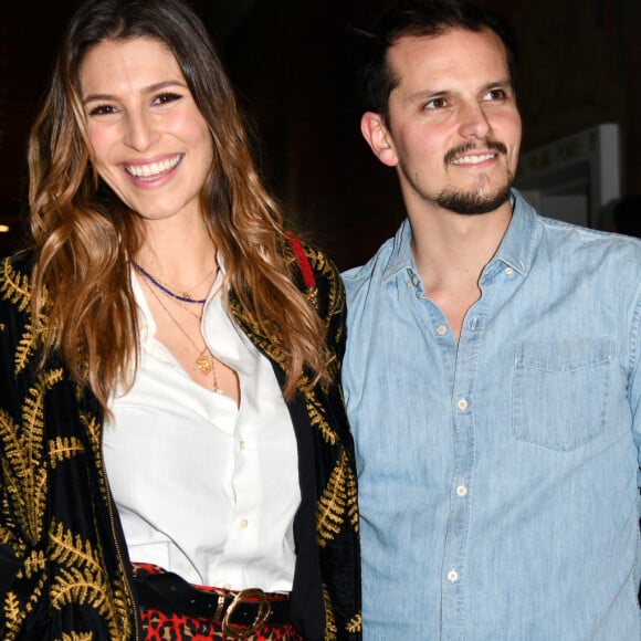 Laury Thilleman (Miss France 2011) et son compagnon Juan Arbelaez à la soirée de lancement de la bouteille d'Evian "Rainbow Inside" collaboration entre Evian et Virgil Abloh au Palais de Chaillot à Paris, France, le 25 février 2019. © Giancarlo Gorassini/Bestimage