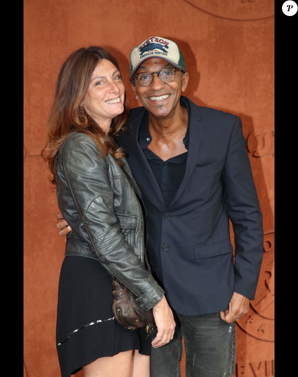 Manu Katché et sa femme Laurence au village (Jour 2) lors des Internationaux de France de Tennis de Roland Garros 2022, à Paris, France, le 23 mai 2022. © Bertrand Rindoff/Bestimage