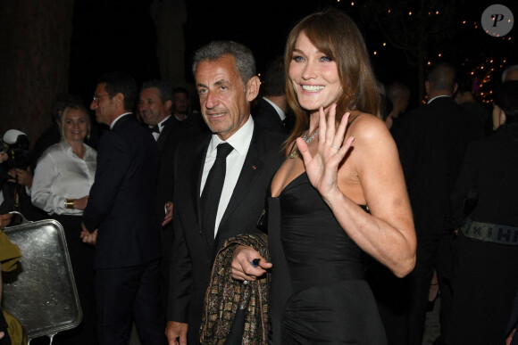 Carla Bruni et son mari Nicolas Sarkozy à la soirée "Women In Motion" par Kering au Château de la Castre lors du 75ème Festival International du Film de Cannes, le 22 mai 2022. 