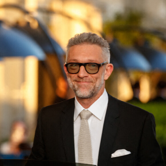 Vincent Cassel et sa femme Tina Kunakey à la sortie de l'hôtel "Martinez" lors du 75ème Festival International du Film de Cannes, le 23 mai 2022.