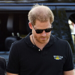 Le prince Harry et Meghan Markle lors du "Land Rover Challenge" au premier jour des Invictus Games 2020 à La Haye, le 16 avril 2022. 