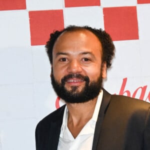 Fabrice Éboué à la première du film "Barbaque" au cinéma Pathé Wepler à Paris, le 19 octobre 2021. © Guirec Coadic/Bestimage