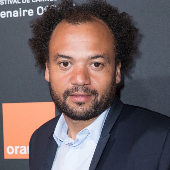 Fabrice Eboué - Photocall de la soirée Orange sur la plage de l'hôtel Majestic lors du 71ème Festival International de Cannes le 12 mai 2018. © Moreau-Borde-Jacovides/Bestimage