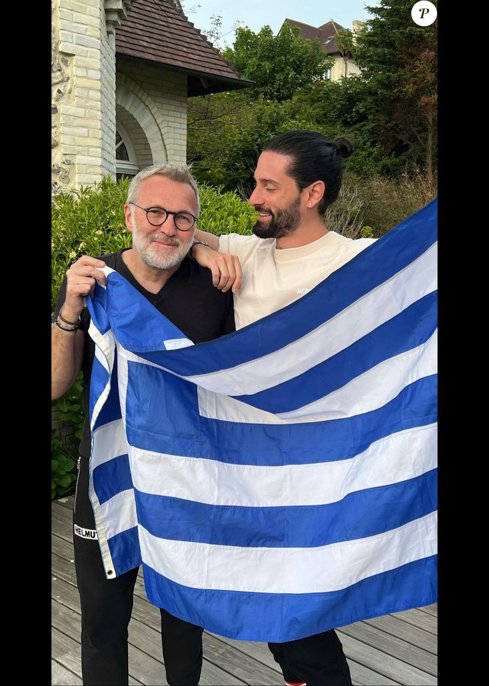 Laurent Ruquier et son compganon Hugo Manos posant ensemble lors d'un