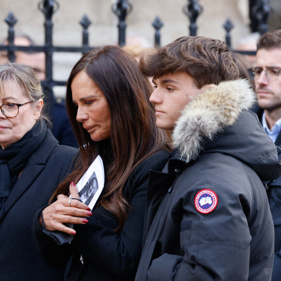 Nathalie Marquay et son fils Tom, Oliver Pernaut - La famille de Jean-Pierre Pernaut à la sortie des obsèques en la Basilique Sainte-Clotilde à Paris le 9 mars 2022. © Cyril Moreau/Bestimage