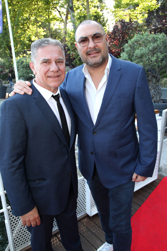 Exclusif - Thierry Chassagne et Benjamin Chulvanij (producteur) - Thierry Chassagne reçoit les insignes de Chevalier dans l'Ordre de la Légion d'Honneur des mains de Lévon Sayan à Paris, France, le 13 juin 2022. © Bertrand Rindoff/Bestimage