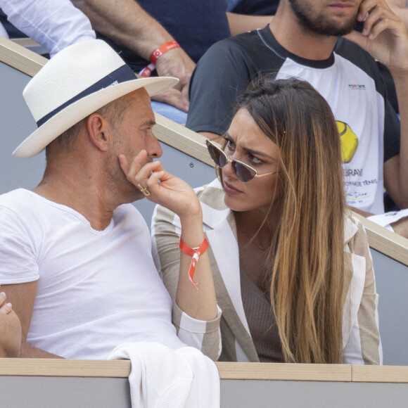 Roger Erhart et sa compagne Delphine Wespiser, Miss France 2012 - Célébrités dans les tribunes des internationaux de France de Roland Garros à Paris le 31 mai 2022. © Cyril Moreau - Dominique Jacovides/Bestimage 