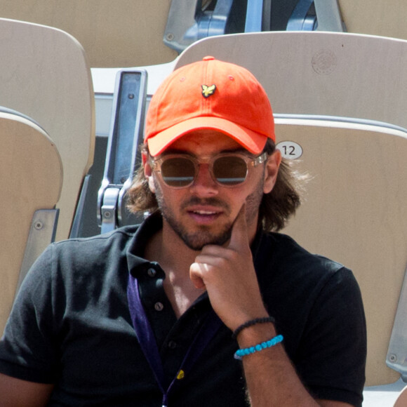 Maëva Coucke (Miss France 2018) et son compagnon François Bonifaci lors des Internationaux de France de tennis de Roland Garros à Paris, France, le 25 mai 2022. 