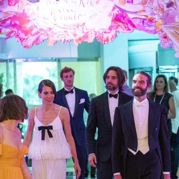 Charlotte Casiraghi et son mari Dimitri Rassam, John Nollet lors du Bal de la Rose 2022 au Sporting Club de Monaco, le 8 juillet 2022. © Cyril Moreau / Pool Monaco / Bestimage