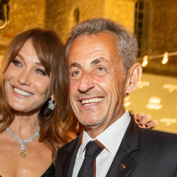 Carla Bruni et son mari Nicolas Sarkozy - Personnalités à la soirée "Women In Motion" par Kering au Château de la Castre lors du 75ème Festival International du Film de Cannes. Le 22 mai 2022 © Olivier Borde / Bestimage 