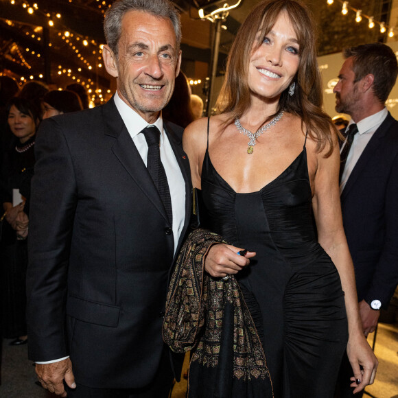 Carla Bruni et son mari Nicolas Sarkozy - Personnalités à la soirée "Women In Motion" par Kering au Château de la Castre lors du 75ème Festival International du Film de Cannes. Le 22 mai 2022 © Olivier Borde / Bestimage 