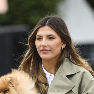 Camille Cerf (Miss France 2015 et Ambassadrice du LGCT-LPEJ 2022), son compagnon Théo Fleury et le chien Romeo - 8ème édition du "Longines Paris Eiffel Jumping" au Champ de Mars à Paris, le 25 juin 2022. © Jean-Baptiste Autissier/Panoramic/Bestimage