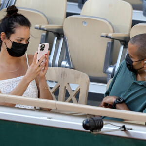 Alizé Lim et son compagnon Tony Parker dans les tribunes des Internationaux de France de Roland Garros à Paris le 11 juin 2021. © Dominique Jacovides / Bestimage 