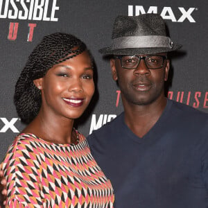 Lilian Thuram et sa compagne Kareen Guiock au photocall lors de l'avant-première mondiale de "Mission: Impossible Fallout" au Palais de Chaillot à Paris © Giancarlo Gorassini/Bestimage