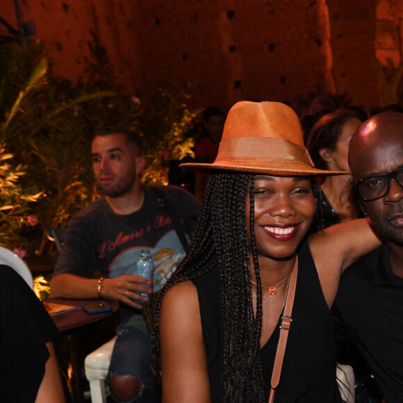 Exclusif - Kareen Guiock et son compagnon Lilian Thuram lors de la soirée du grand gala du "Marrakech du Rire 2022" pour la 10ème édition au palais El Badiî à Marrakech, Maroc, le 18 juin 2022. © Rachid Bellak/Bestimage