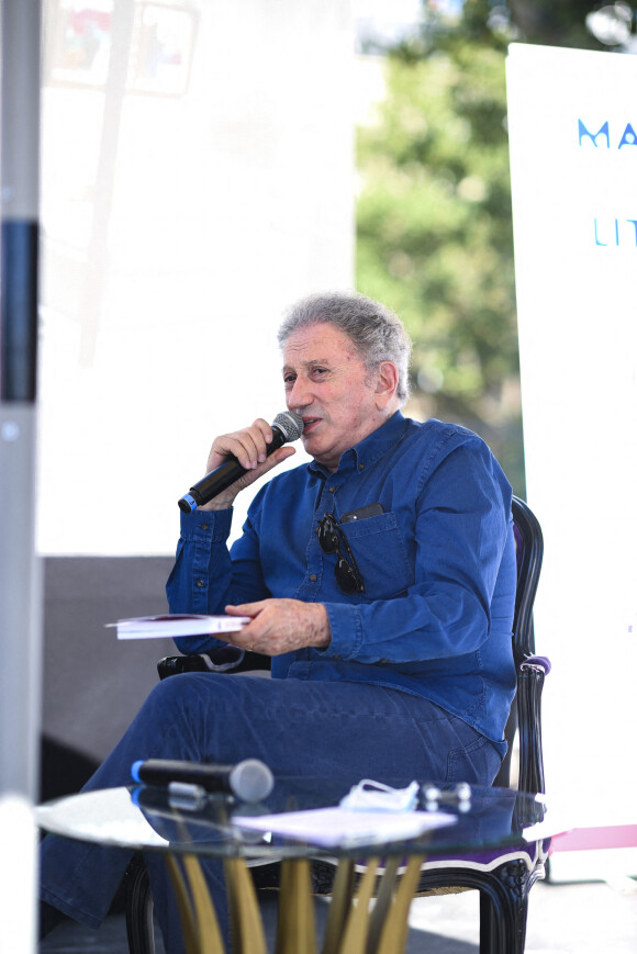 Exclusif - Michel Drucker - Festival des Livres et des Artistes organisé par l'association "Lecture pour Tous" engagée dans la lutte contre l'illettrisme au Mail Branly à Paris le 2 juillet 2022. © Pierre Perusseau / Jack Tribeca / Bestimage 