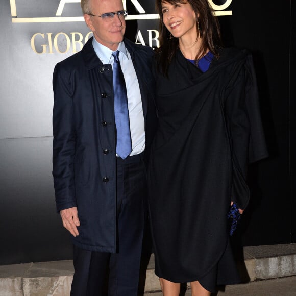 Sophie Marceau et son compagnon Christophe Lambert - Arrivée des people au défile Giorgio Armani Haute Couture Printemps/Ete 2014 au Palais de Tokyo a Paris, le 21 janvier 2014. 
