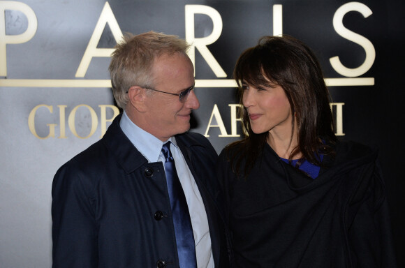 Sophie Marceau et son compagnon Christophe Lambert - Arrivée des people au défilé Giorgio Armani Haute Couture Printemps/Ete 2014 au Palais de Tokyo a Paris, le 21 janvier 2014. 