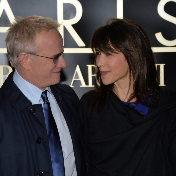 Sophie Marceau et son compagnon Christophe Lambert - Arrivée des people au défilé Giorgio Armani Haute Couture Printemps/Ete 2014 au Palais de Tokyo a Paris, le 21 janvier 2014. 