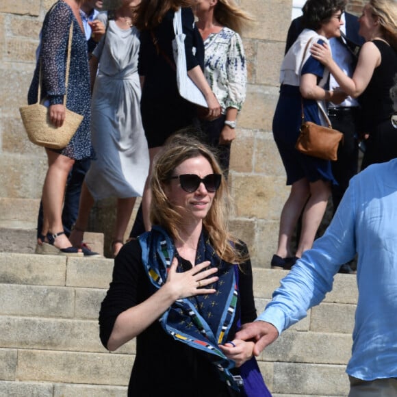 Exclusif - Maud Baecker, Patrick Rocca - Sorties des obsèques de Charlotte Valandrey en l'église de Pléneuf-Val-André en Bretagne. Le 19 juillet 2022