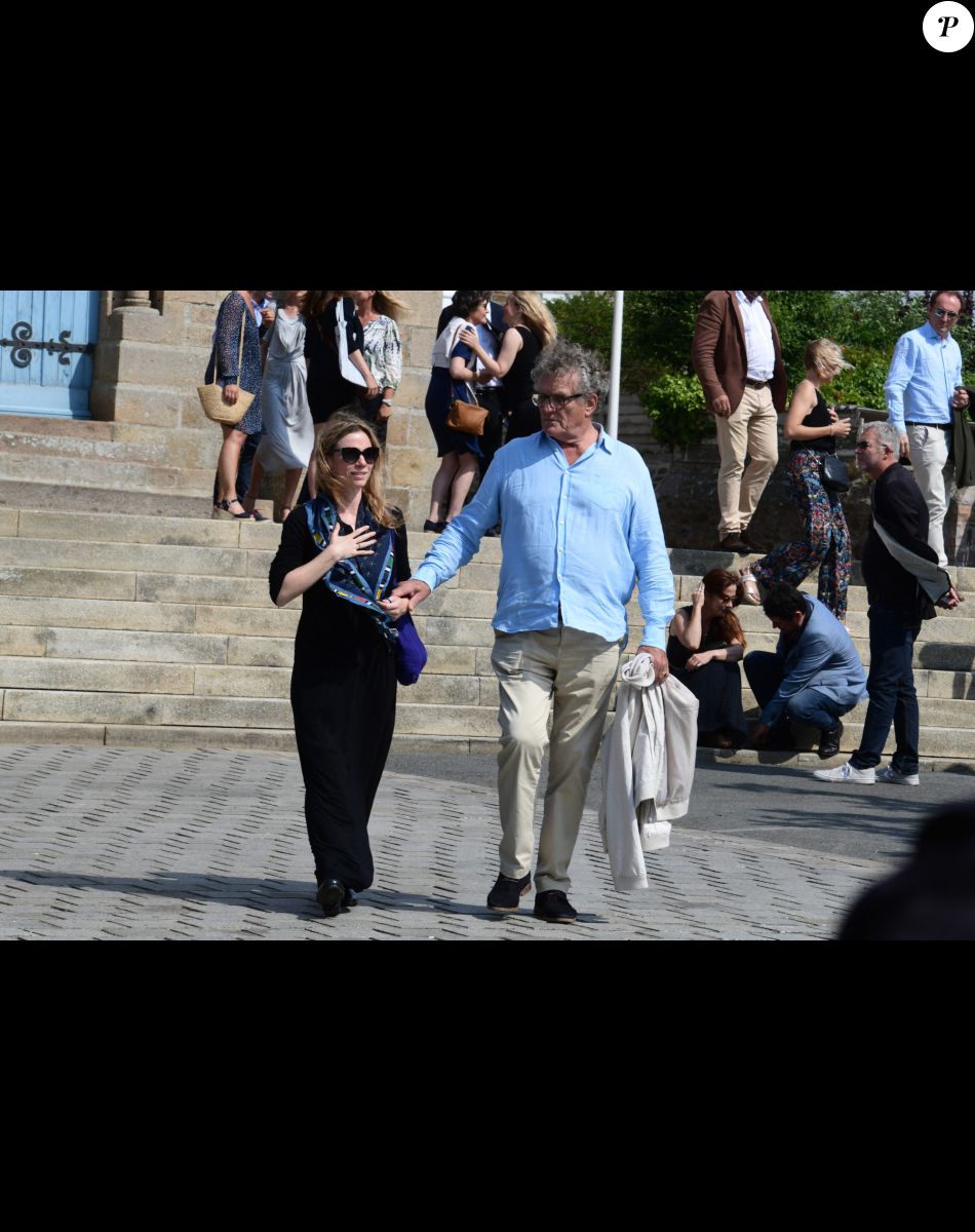 Exclusif - Maud Baecker, Patrick Rocca - Sorties des obsèques de Charlotte Valandrey en l'église de Pléneuf-Val-André en Bretagne. Le 19 juillet 2022