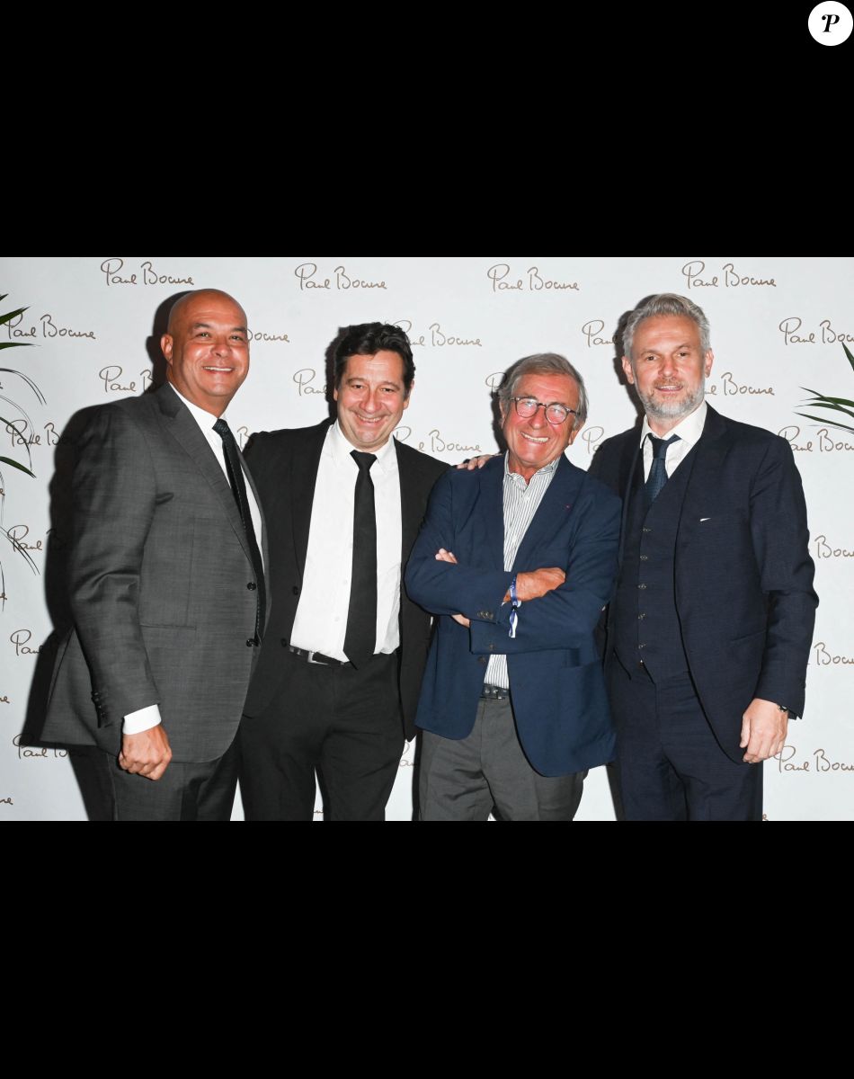 Exclusif - Jérôme Bocuse (Président des Maisons Bocuse), Laurent Gerra, guest et Paul-Maurice Morel (directeur général associé des Maisons Bocuse) - La Brasserie du Louvre Bocuse à l'occasion de la rentrée, a convié de nombreux invités à venir découvrir ou redécouvrir son magnifique cadre en plein centre de Paris le 22 septembre 2022. 3 ans après son inauguration, J. Bocuse a accueilli et chouchouté ses invités grâce aux mets typiquement lyonnais concoctés par ses Chefs Exécutifs Meilleurs Ouvriers de France. © Coadic Guirec/Bestimage
