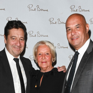 Exclusif - Laurent Gerra, Jérôme Bocuse (Président des Maisons Bocuse) avec sa maman Raymone Carlut - La Brasserie du Louvre Bocuse à l'occasion de la rentrée, a convié de nombreux invités à venir découvrir ou redécouvrir son magnifique cadre en plein centre de Paris le 22 septembre 2022. 3 ans après son inauguration, J. Bocuse a accueilli et chouchouté ses invités grâce aux mets typiquement lyonnais concoctés par ses Chefs Exécutifs Meilleurs Ouvriers de France. © Coadic Guirec/Bestimage