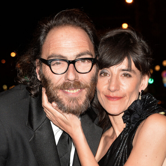 Romane Bohringer et son compagnon Philippe Rebbot lors de la 10ème cérémonie des Globes de Cristal au Lido à Paris, le 13 avril 2015.