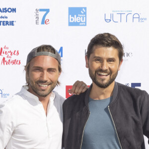 Exclusif - Ghislain Gerin et son mari Christophe Beaugrand - Festival des Livres et des Artistes organisé par l'association "Lecture pour Tous" engagée dans la lutte contre l'illettrisme au Mail Branly à Paris le2 juillet 2022. © Pierre Perusseau/ Jack Tribeca / Bestimage 