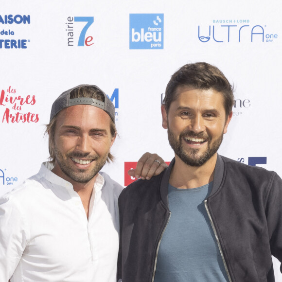 Exclusif - Ghislain Gerin et son mari Christophe Beaugrand - Festival des Livres et des Artistes organisé par l'association "Lecture pour Tous" engagée dans la lutte contre l'illettrisme au Mail Branly à Paris le2 juillet 2022. © Pierre Perusseau/ Jack Tribeca / Bestimage 