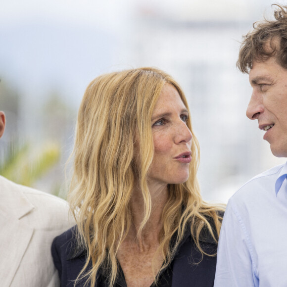 Sandrine Kiberlain et Cédric Jimenez au photocall du film "Novembre" lors du 75ème Festival International du Film de Cannes, France, le 23 mai 2022. © Cyril Moreau/Bestimage 