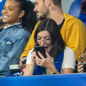 M. Pokora (Matt Pokora), sa femme Christina Milian assistent au match de la 5ème et avant-dernière journée de Ligue des nations entre la France et l'Autriche (2-0) au Stade de France à Saint-Denis le 22 septembre 2022.