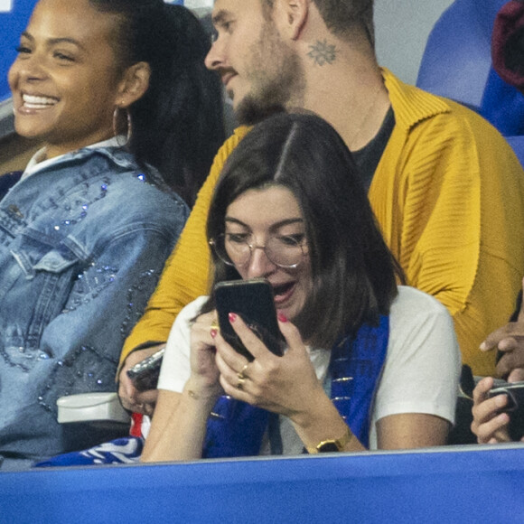 M. Pokora (Matt Pokora), sa femme Christina Milian assistent au match de la 5ème et avant-dernière journée de Ligue des nations entre la France et l'Autriche (2-0) au Stade de France à Saint-Denis le 22 septembre 2022.