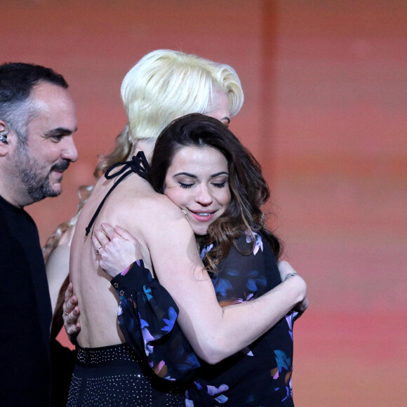 Exclusif - No Web - No Tabloids - François-Xavier Demaison, Katrina Patchett, Denitsa Ikonomova - Surprises - Enregistrement de l'émission "La Chanson secrète 11" à Paris, diffusée le 24 juin sur TF1. Le 15 janvier 2022 Après le succès des précédentes éditions, « LA CHANSON SECRETE », présentée par N.Aliagas et produite par DMLS TV, revient sur TF1. 8 artistes ne savent rien de ce qui va se passer pour eux ! Ils ont accepté de jouer le jeu, de se laisser totalement surprendre, émouvoir, parfois même déstabiliser car ils vont découvrir en même temps que les téléspectateurs une surprise : une chanson qui leur est chère revisitée et réinterprétée par un artiste. Des mises en scène spectaculaires au service de l’émotion… Et des émotions fortes pour l’artiste assis dans le fauteuil grâce à la venue sur le plateau de proches et d’invités inattendus. Les téléspectateurs seront aux premières loges pour vivre ces moments d’intimité musicale rare. Dans ce nouveau numéro, un couple rare en télévision, un chef étoilé, un invité piégé venu pour répéter une surprise à un autre guest sans s'attendre à être lui-même invité dans le fauteuil, des participants exceptionnels tels que le frère d'un guest pour la première fois en France... © Jacovides-Moreau / Bestimage  Exclusive - No Web No Blog pour Belgique et Suisse 