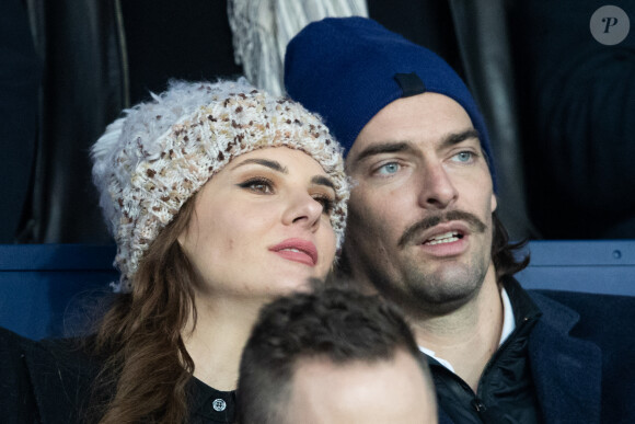 Camille Lacourt et sa compagne Alice Detollenaere (Miss Bourgogne 2010) dans les tribunes lors du match de championnat de Ligue 1 Conforama opposant le Paris Saint-Germain (PSG) aux Girondins de Bordeaux au Parc des Princes à Paris, France, le 23 février 2020. © Cyril Moreau/Bestimage 