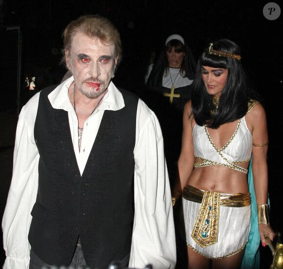 Johnny Hallyday et sa femme Laeticia Hallyday - People a la soiree annuelle d'Halloween organisee par Kate Hudson a Brentwood, le 26 octobre 2013. 